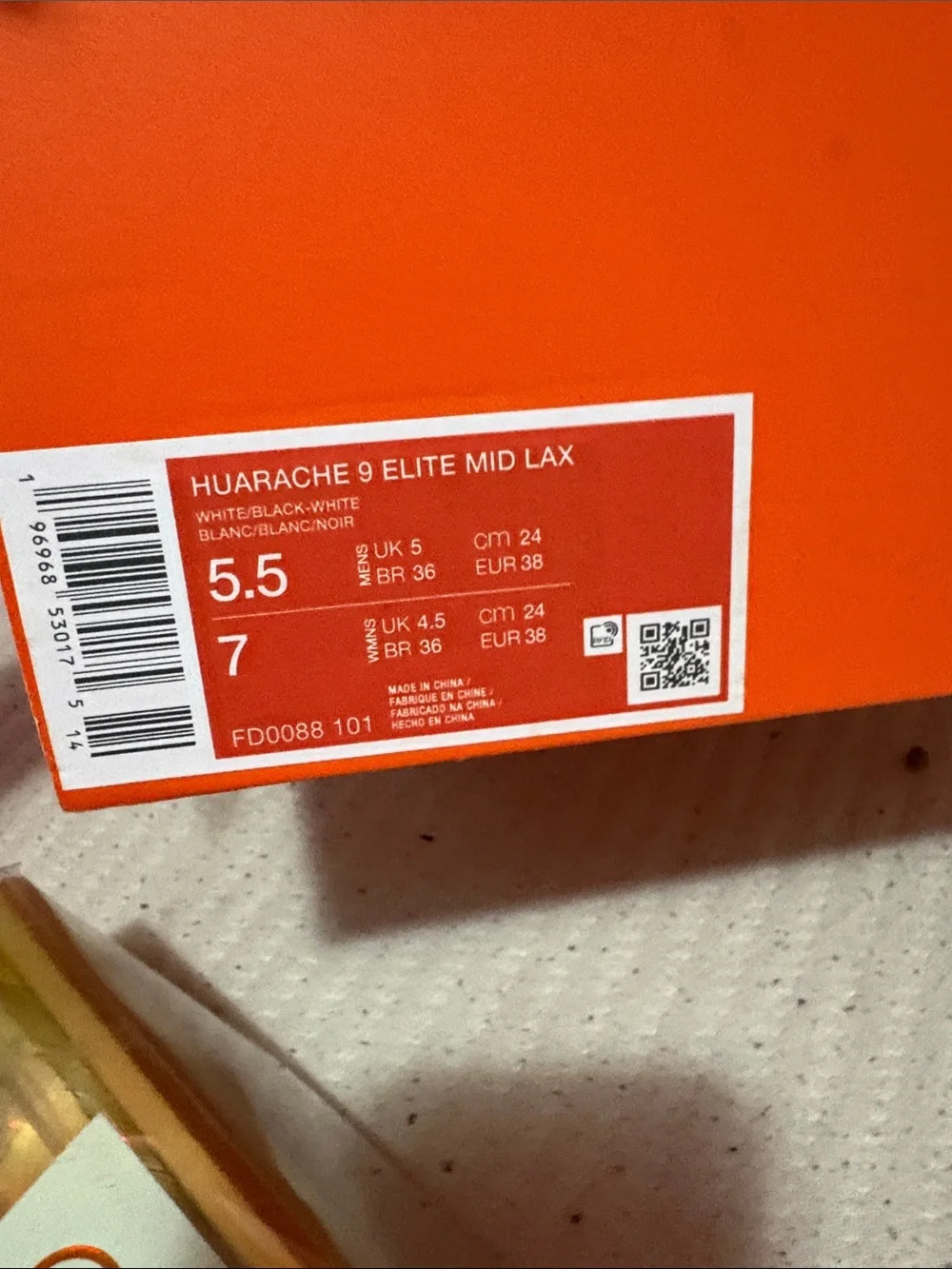 Nike White Cleats with Black Swoosh
